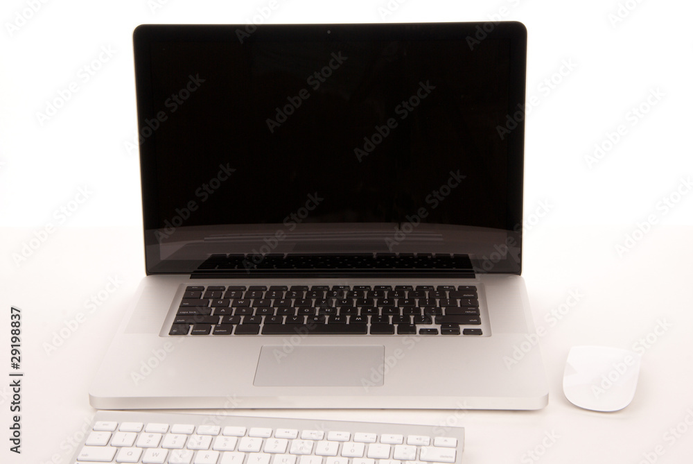 Opened laptop computer keyboard and mouse Opened laptop computer keyboard and mouse