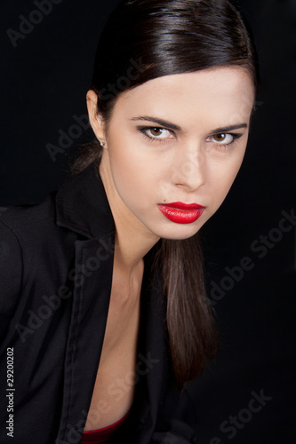 Beautiful young woman with red lipstick