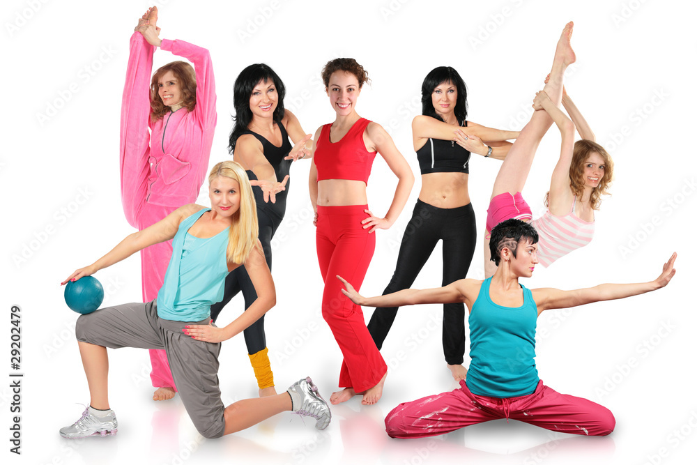 Obraz premium Smiling seven girls group in sportswear does gymnastic exercise