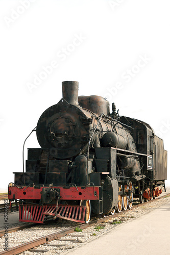Old steam train isolated on white