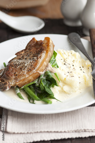Pork chop with mashed potatoes and cider sauce