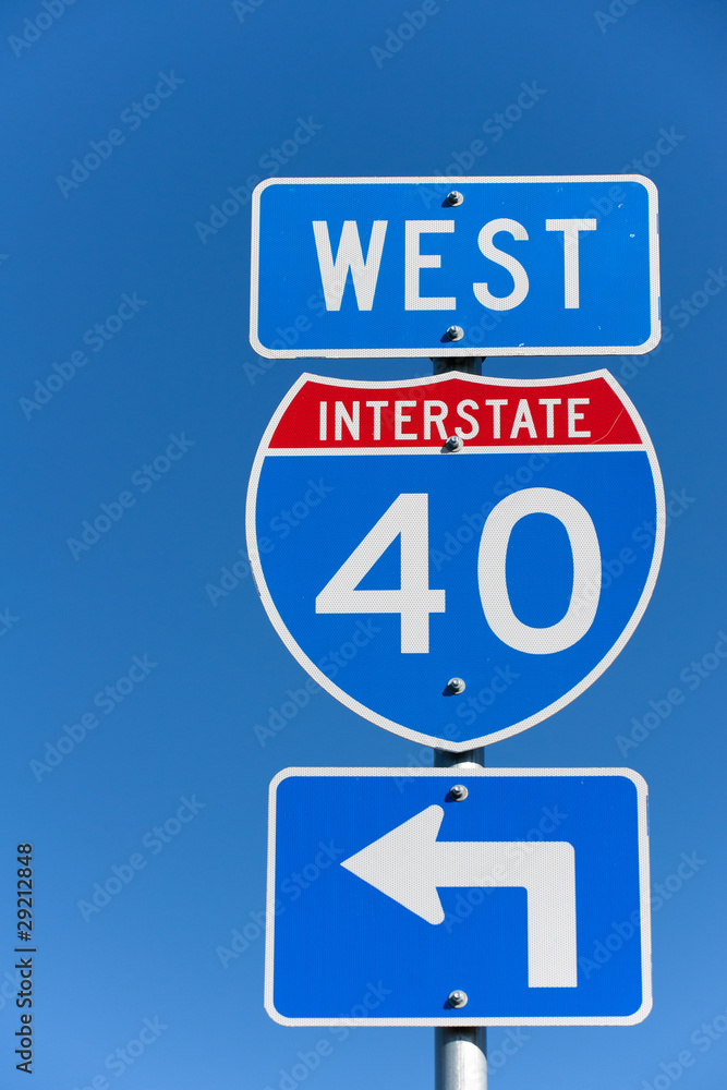 American Interstate I-40 West sign on blue background American Interstate I-40 West sign on blue background