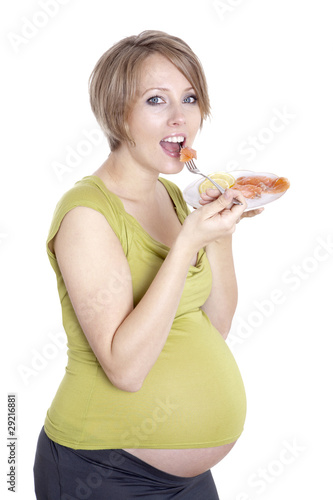 pregnant woman eats smoked salmon