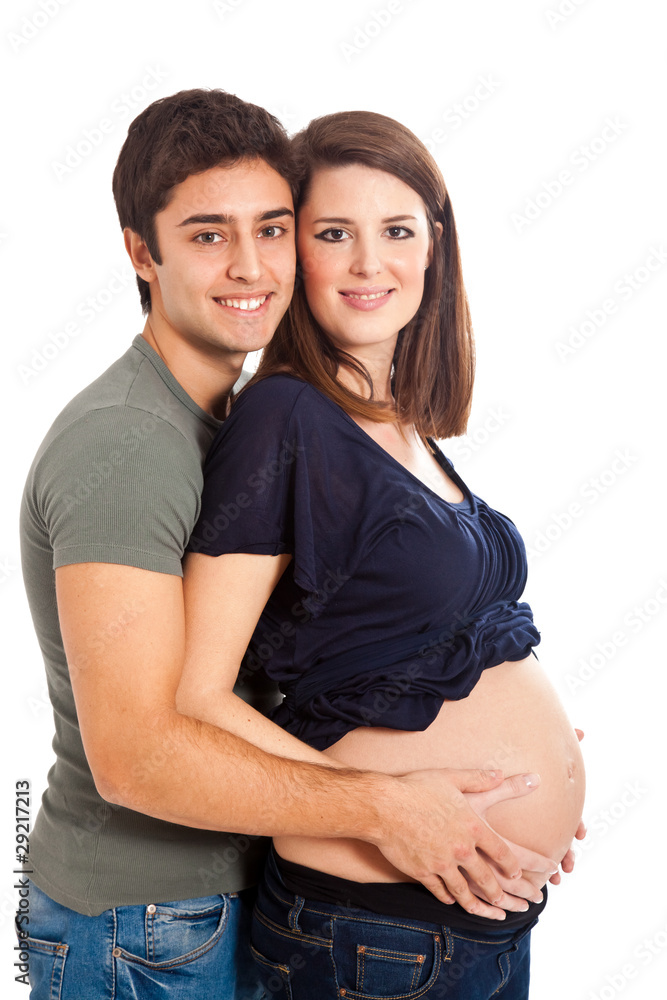 Mom and dad with hands on pregnant belly isolated on white Mom and dad with hands on pregnant belly isolated on white