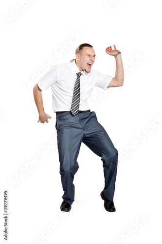 Businessman dancing and screaming