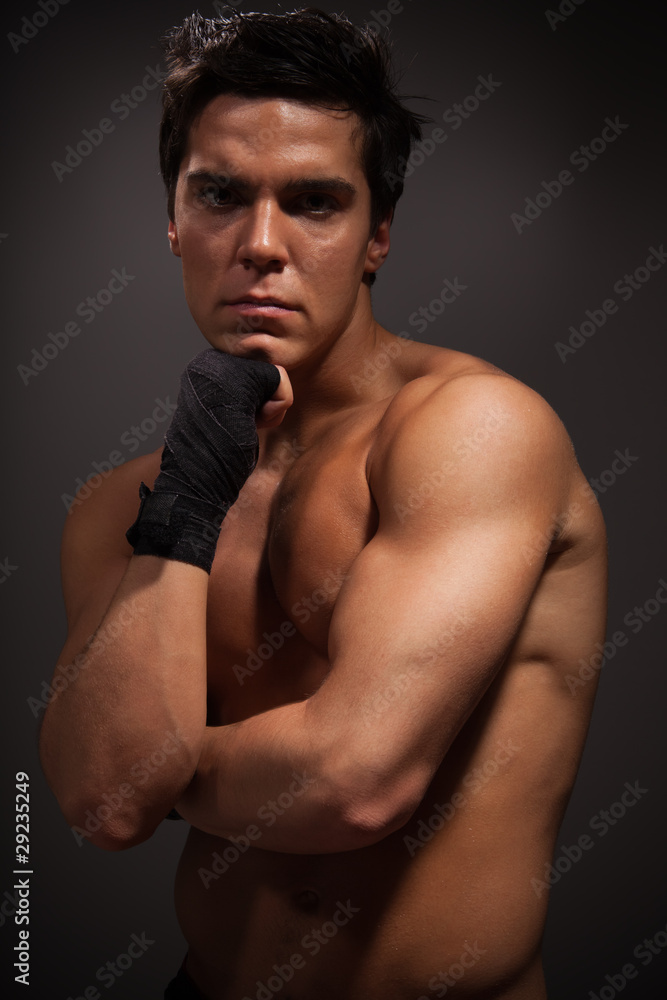 Handsome muscular man thinking