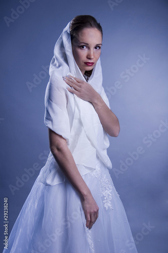 Beautiful woman in white showl. photo