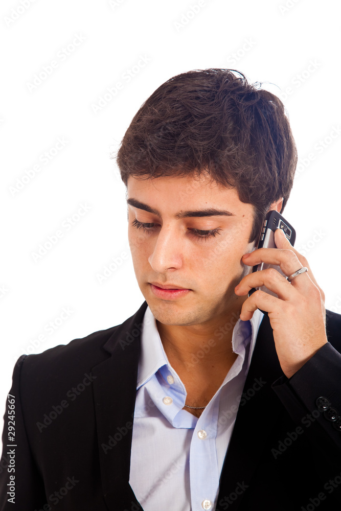 Businessman portrait talking at the phone isolated on white Businessman portrait talking at the phone isolated on white