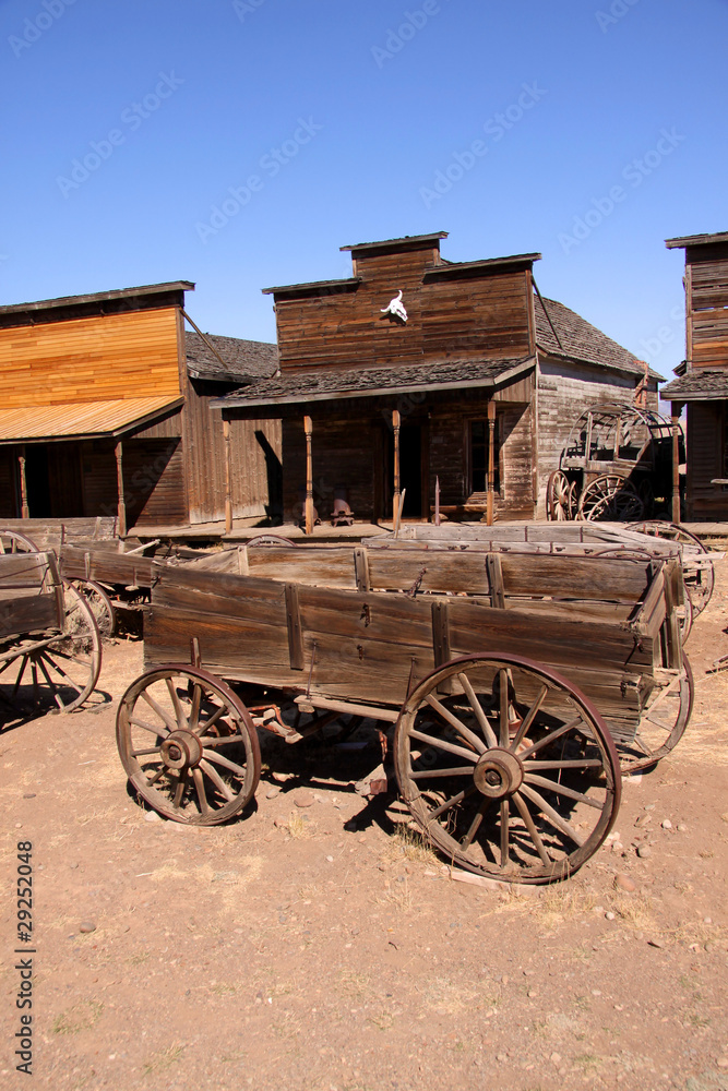 Obraz premium Old carts in a Ghost town near Cody, Wyoming