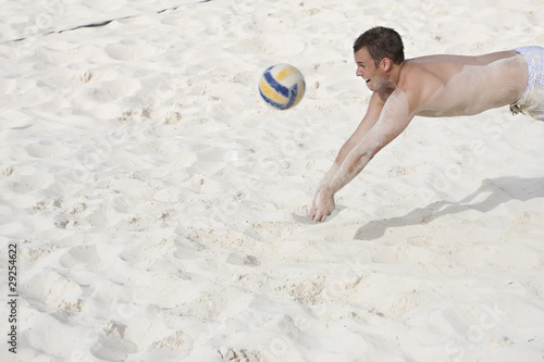 Playing Beach Volleyball photo