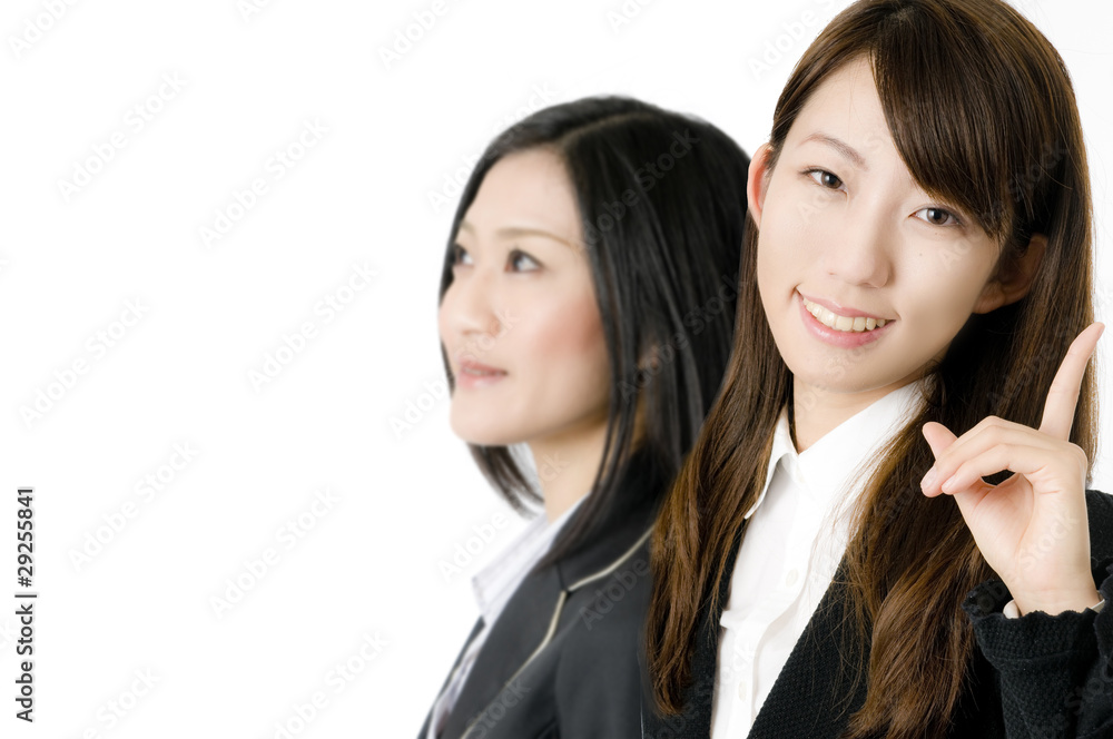 指差す女性社員 指差す女性社員