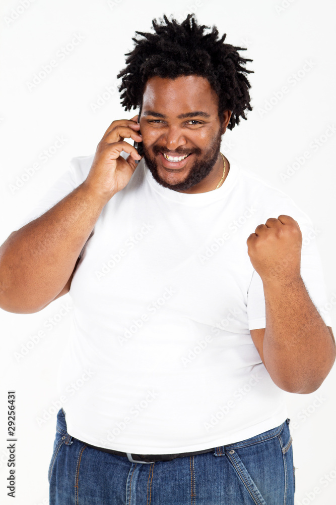 overweight african american man speaking on the phone overweight african american man speaking on the phone