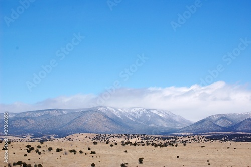 Rolling mountain hills with clouds