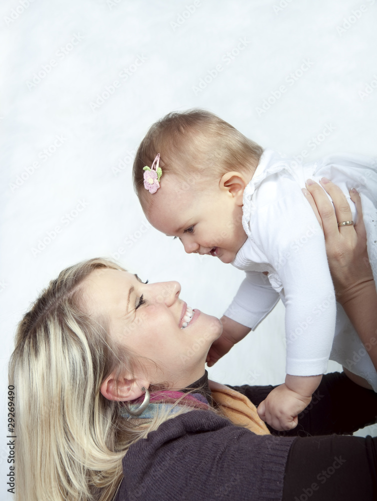 beautiful mother with her baby girl