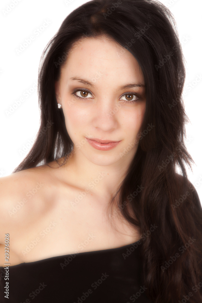 Dark hair woman portrait slight smile Dark hair woman portrait slight smile