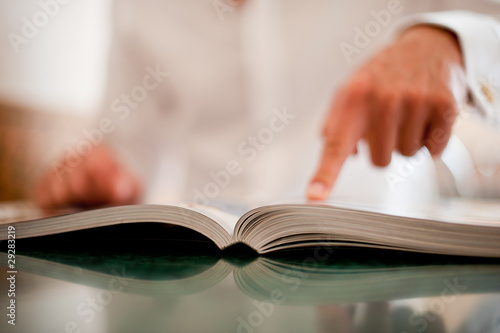 book and hand