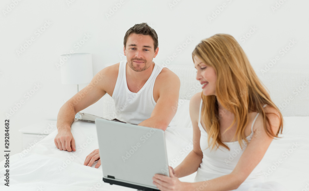 Lovers looking at the laptop
