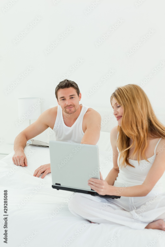 Lovers looking at the laptop