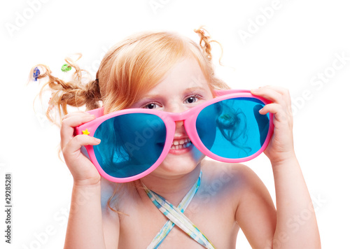 little girl in big glasses