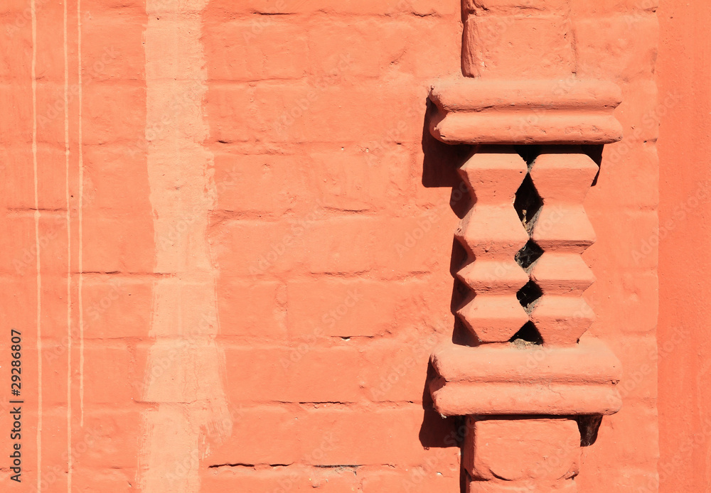 decorative element on brick wall decorative element on brick wall