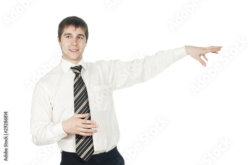 businessman holding his arm out presenting something