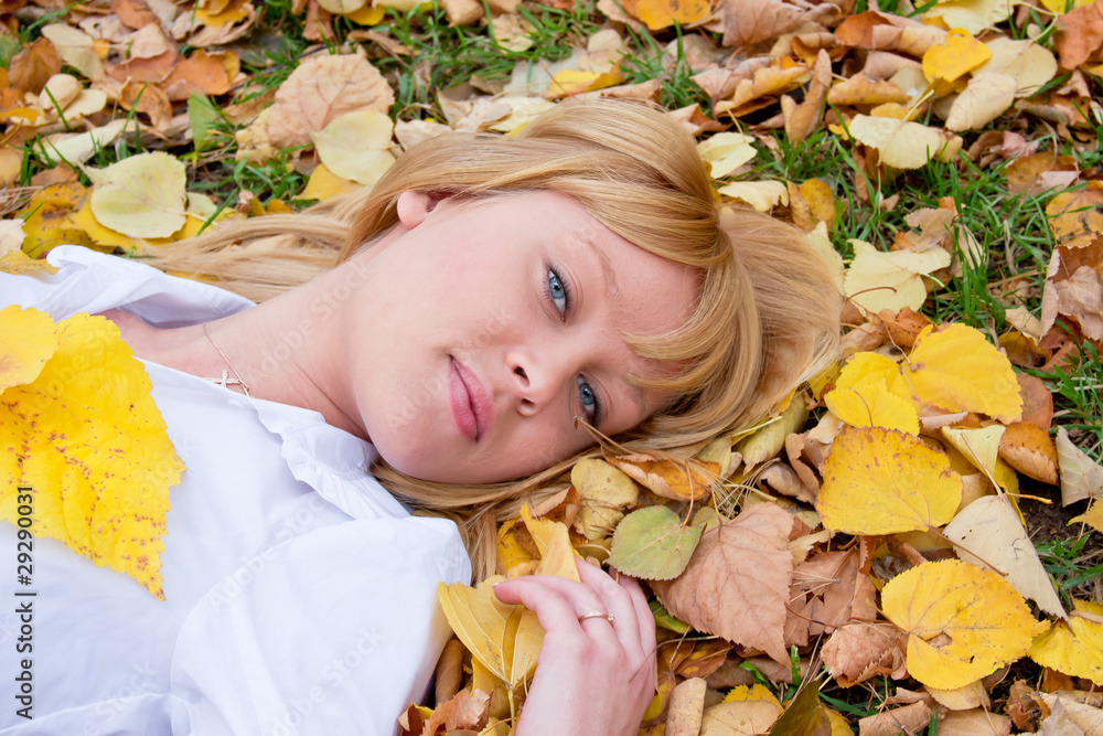 woman is in an autumn park woman is in an autumn park