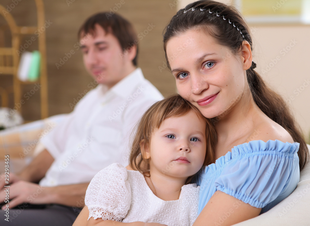 young mother with a daughter at home young mother with a daughter at home