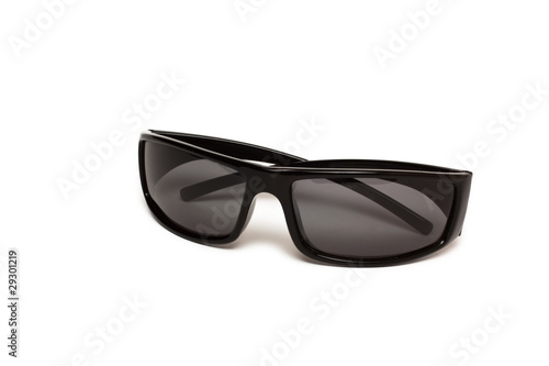 Black sunglasses over white background