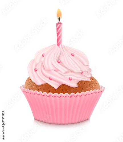 Pink birthday cupcake with burning candle