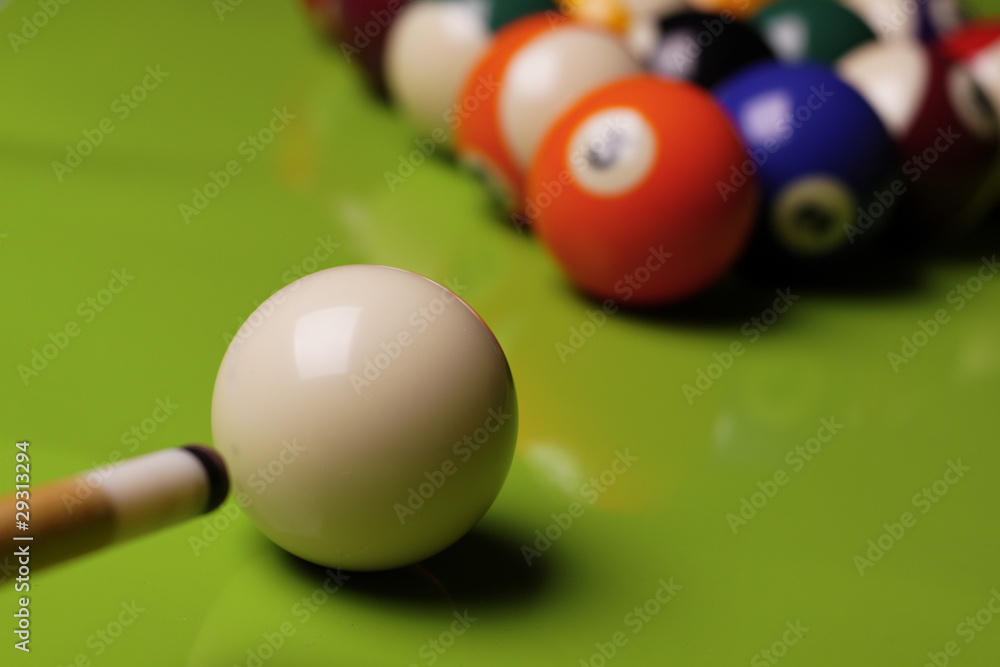 Billiard balls, cue on green table!