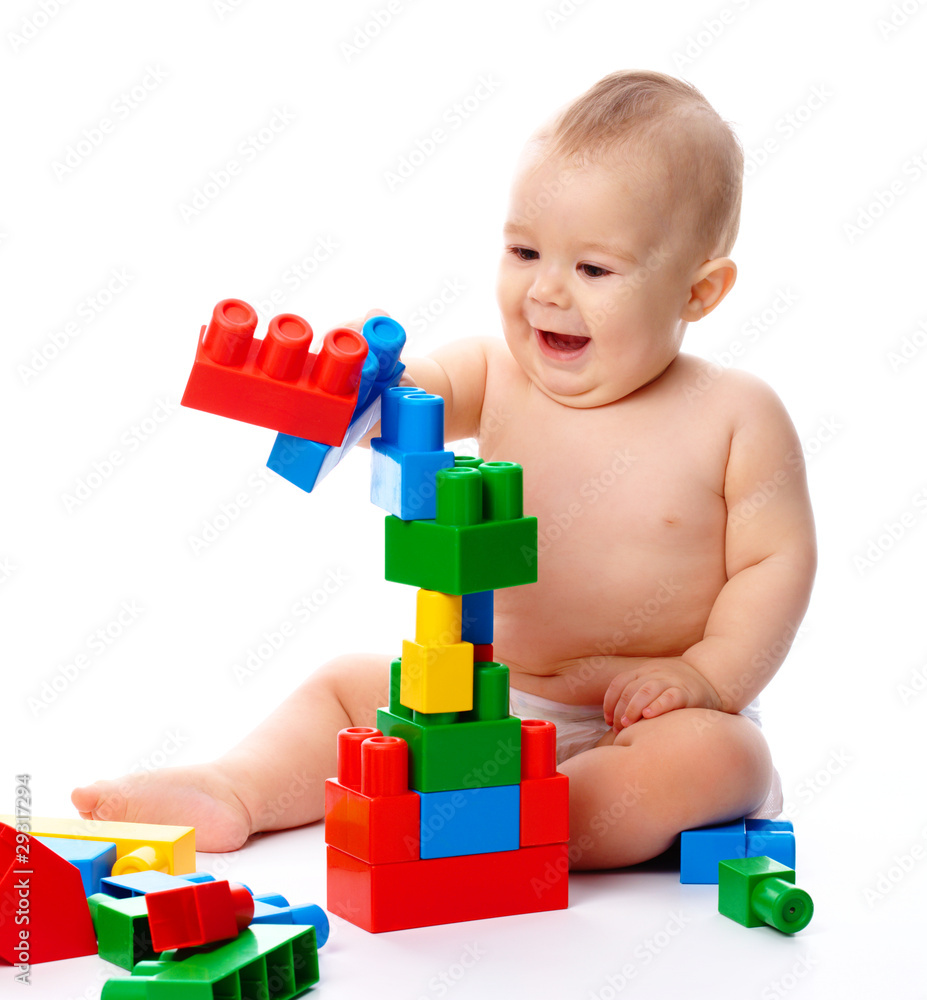 Little boy with building bricks Little boy with building bricks
