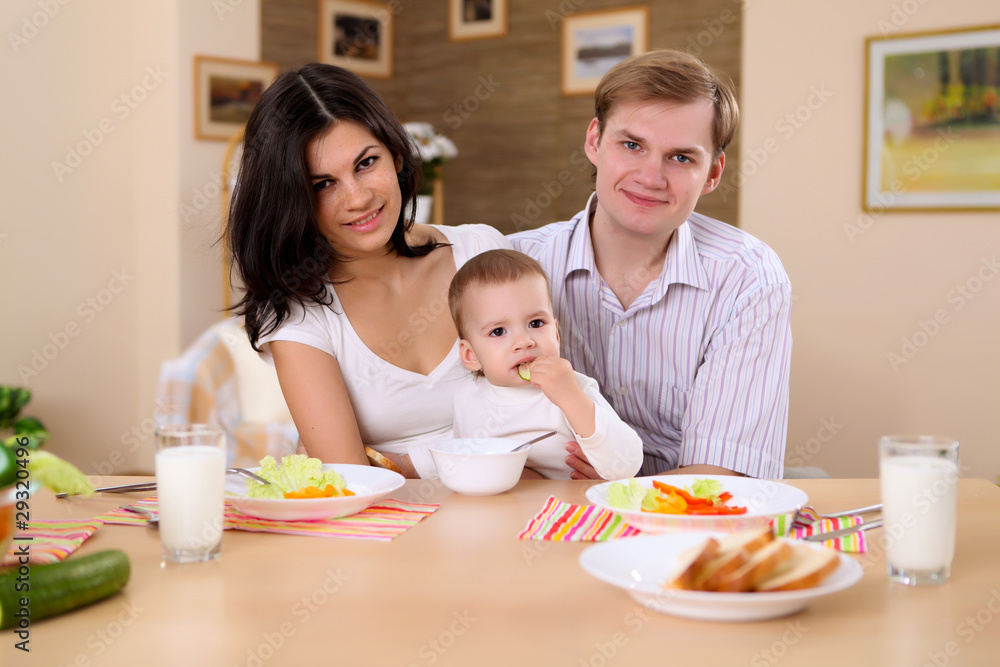 young family at home having meal