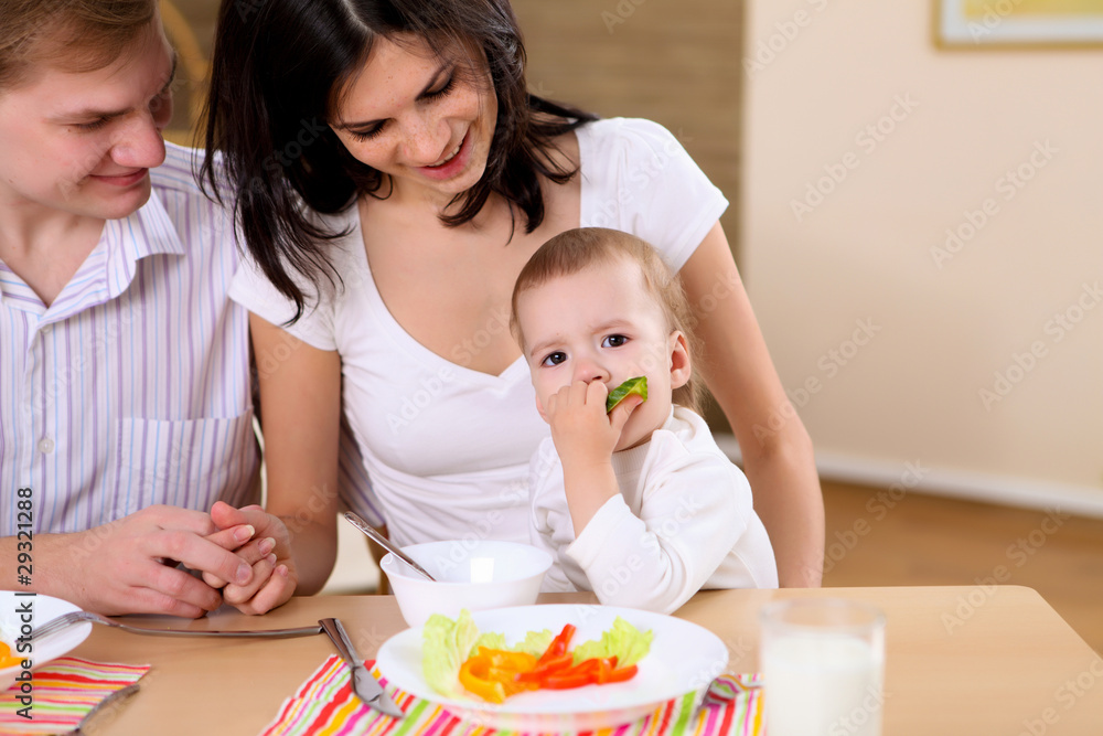 young family at home having meal