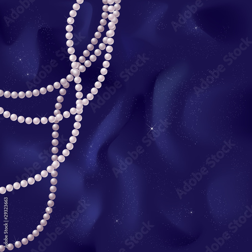 Pink pearls on a blue silk