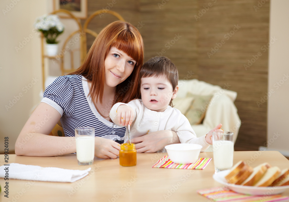 mother feeding a baby at home mother feeding a baby at home