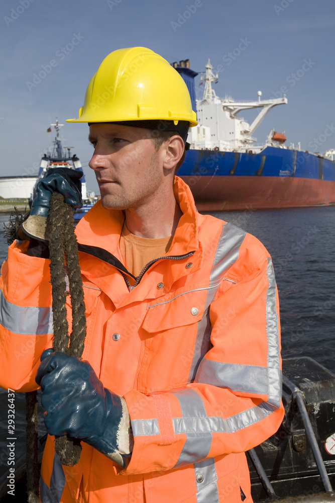 Working at a port. Working at a port.