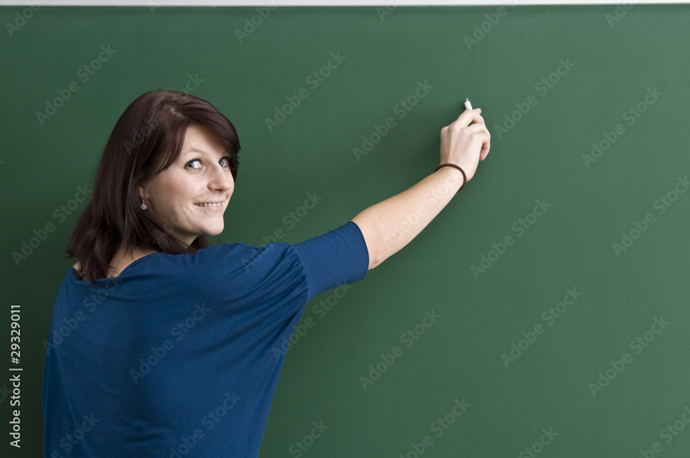 Young Student at blackboard.