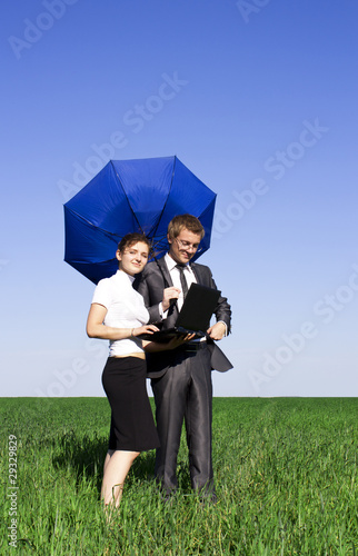 An insurance agent ready to protect you with his umbrella