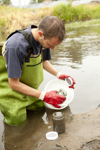 Taking samples of the soil and groundwater, environmental resear