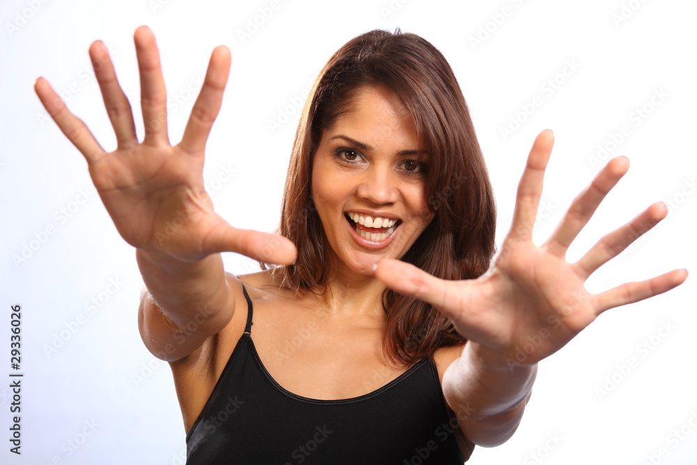 Happy girl with fingers spread arms outstretched Happy girl with fingers spread arms outstretched