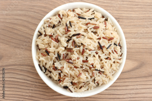 Bowl with cooked rice of various types