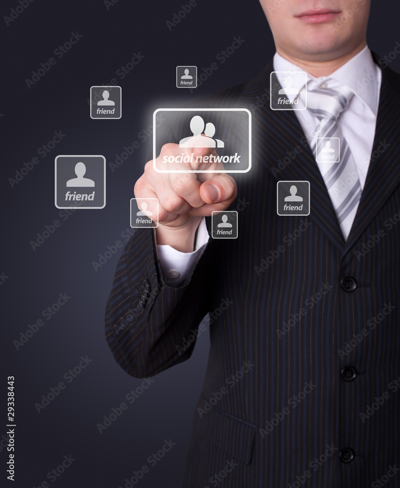 Man pressing social network button Man pressing social network button