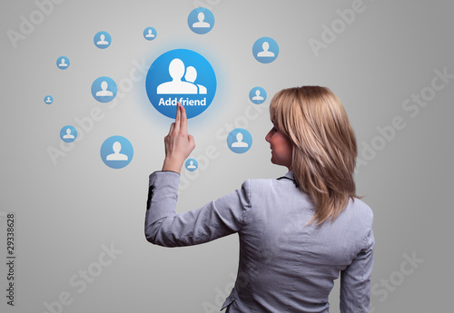 hand pressing social network icon