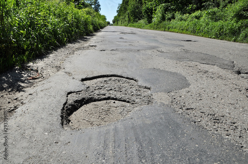 Hole on damage road photo