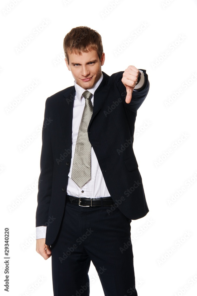 Businessman showing his thumb down Businessman showing his thumb down