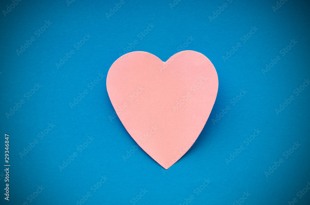 Obraz premium Heart shaped sticky notes on the background