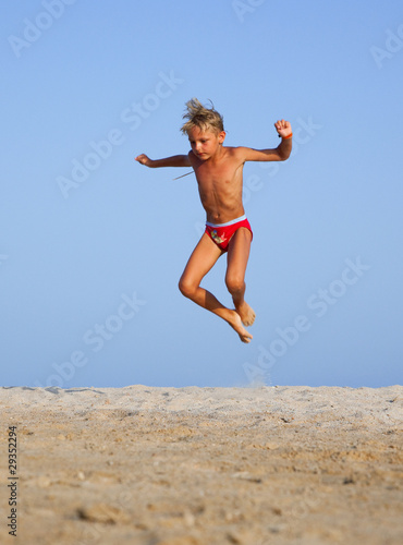 The boy jumps