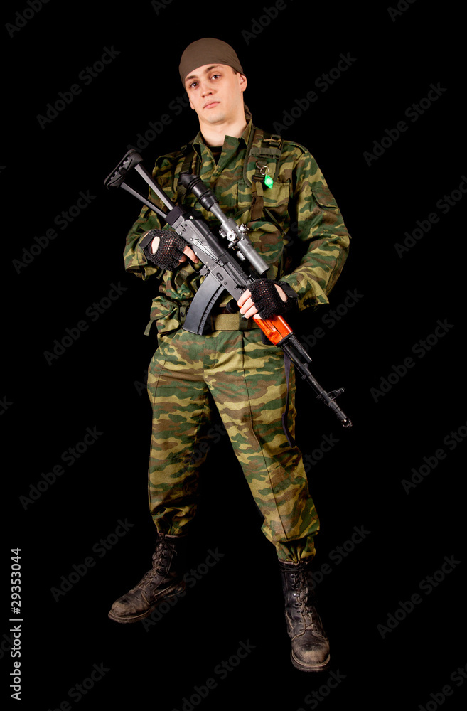 Soldier in uniform with weapon Soldier in uniform with weapon