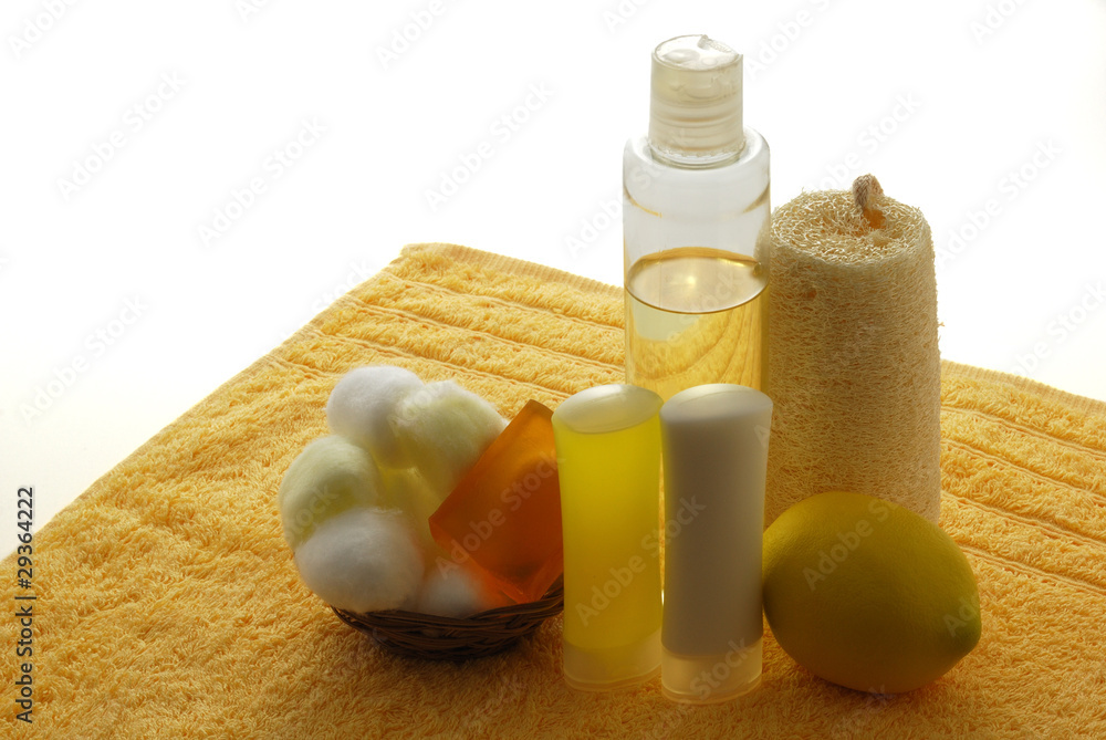 Lemon flavored SPA set on yellow towel Lemon flavored SPA set on yellow towel