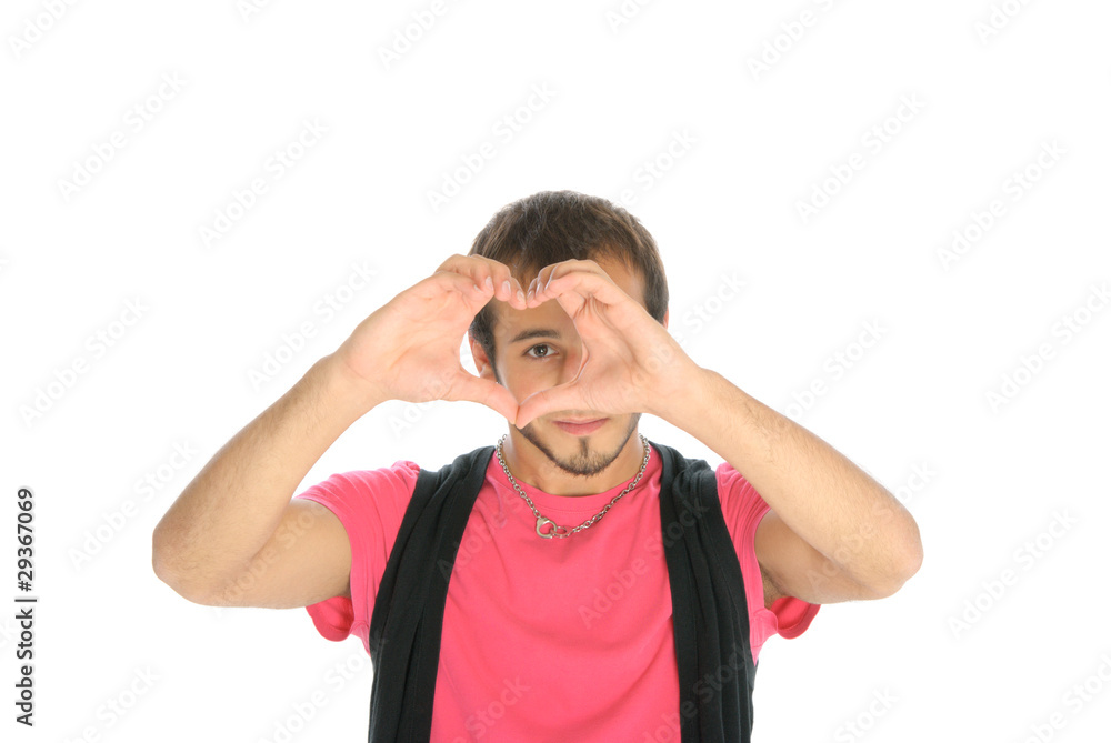 Fototapeta premium Young man shows heart symbol